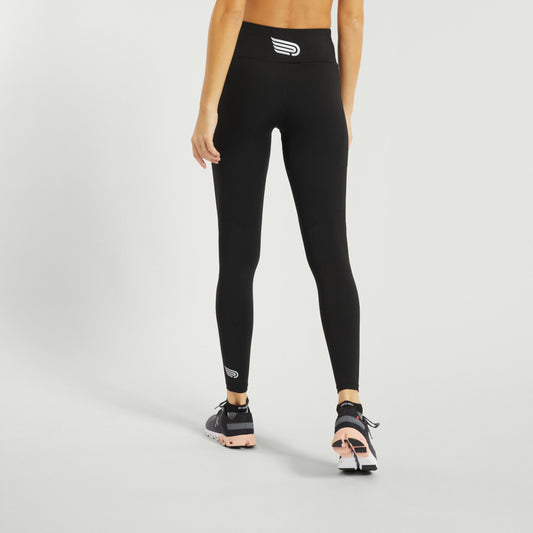 Pressio tights for dame i fargen svart. High-rise. På modell bakfra.