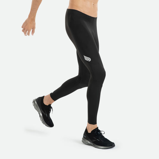 Pressio tights for herre i fargen svart. På modell fra siden. Nærbilde.