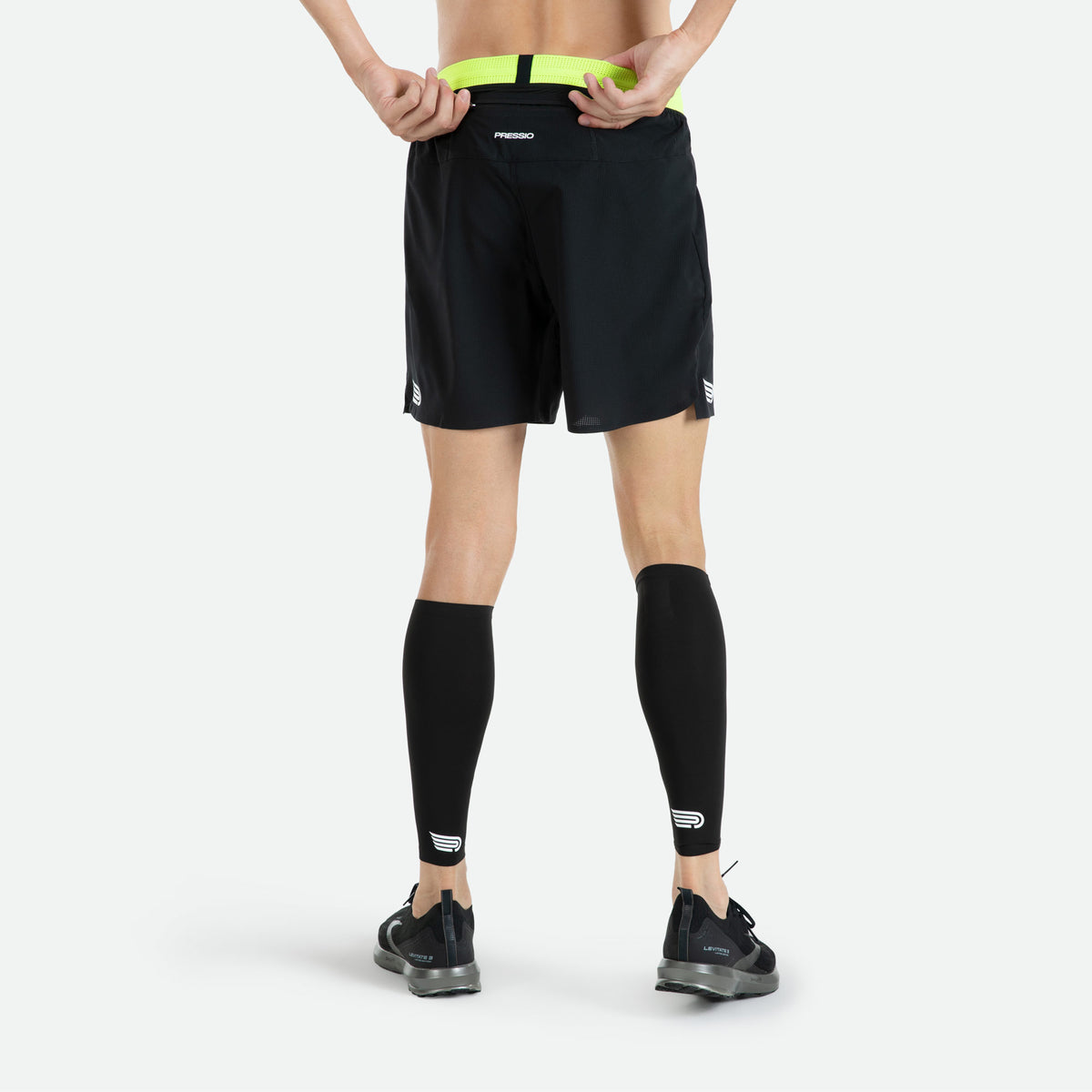 PRESSIO Ārahi 6.5’ Shorts - Svart &amp; Fluor Grønn