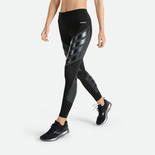 Pressio Power tights for dame i fargen svart. Mid-rise. På modell forfra. 